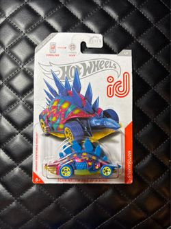 Hot Wheels ID Motosaurus toy car with blue, red, and yellow dinosaur-themed design #dinosaur #collectible