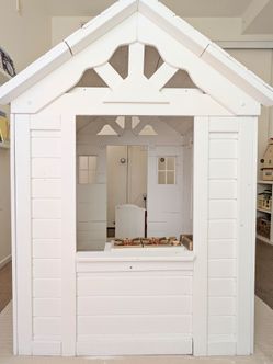 White wooden kids play house
