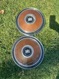 Vintage Hubcaps with Crest Emblem – Set of 2
