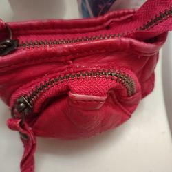 Small..Coin Purse...Color Fiusha...Used But Good Condition..