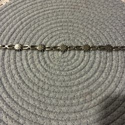 antique estate sterling silver bracelet featuring sun-face links, likely made in Taxco, Mexico.