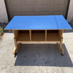 CHILDCRAFT USA ACTIVITY/MEDIA TABLE WITH 3 CUBBIES-ADJUSTABLE W/WHEELS 