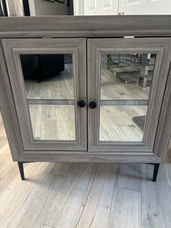 Gray Wood Cabinet with Mirrored Doors