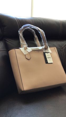 New Nine West beige purse in original packing and tags