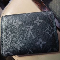 Like New Louis Vuitton envelope business card holder. 
