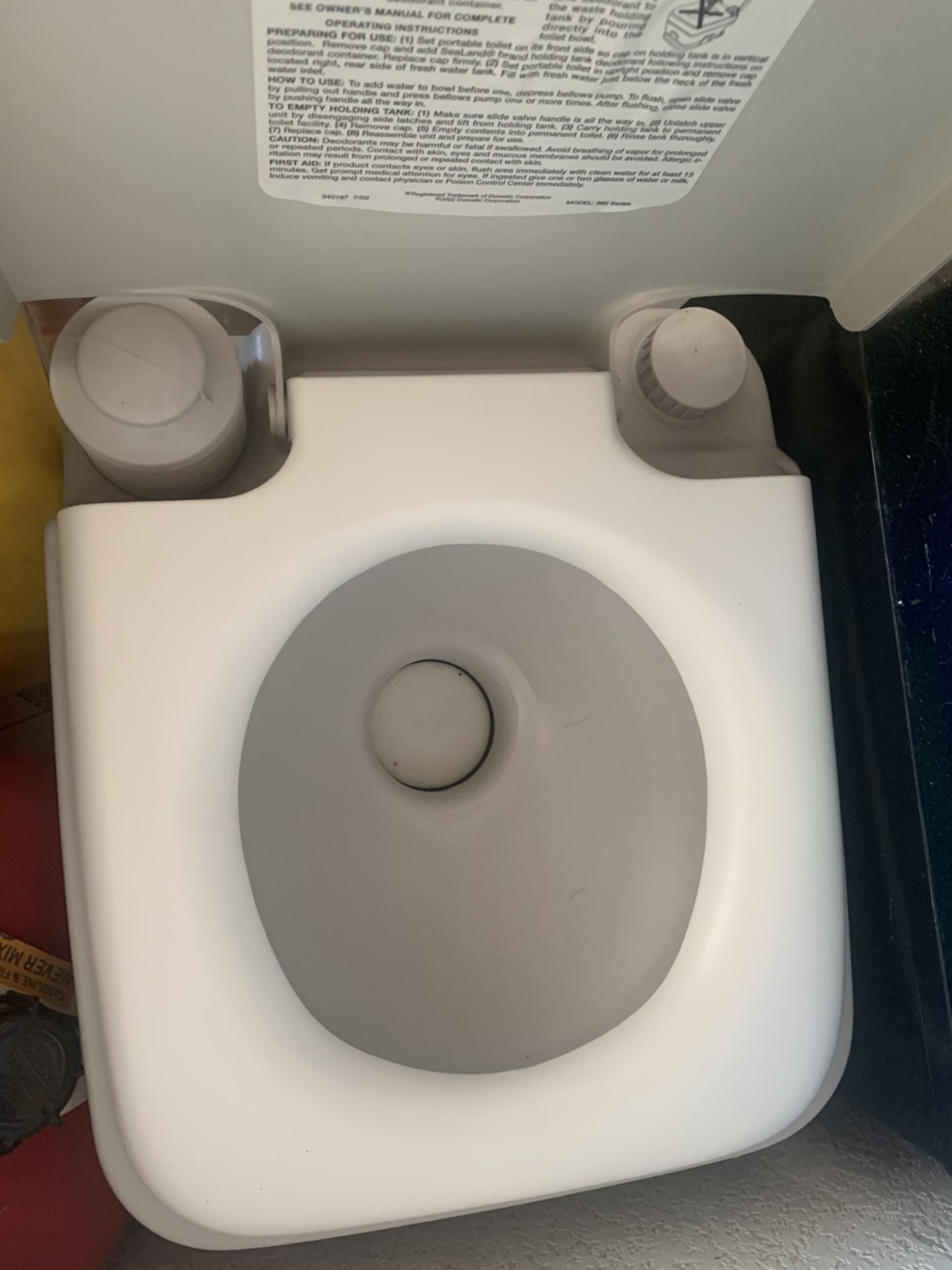 Portable toilet for boat camping or rv