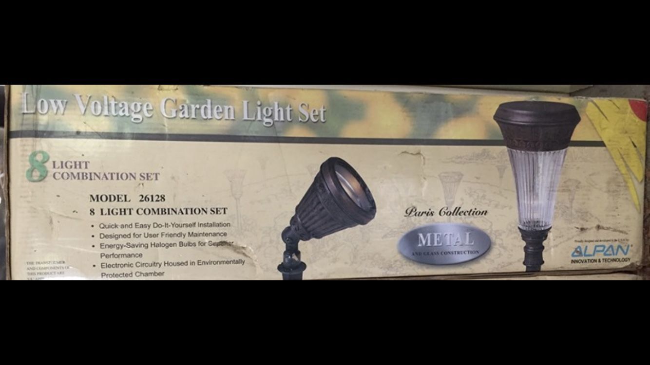 2 sets of brand new never used 8 low voltage garden lights