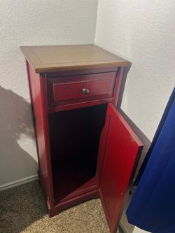 Vintage two tone red storage cabinet