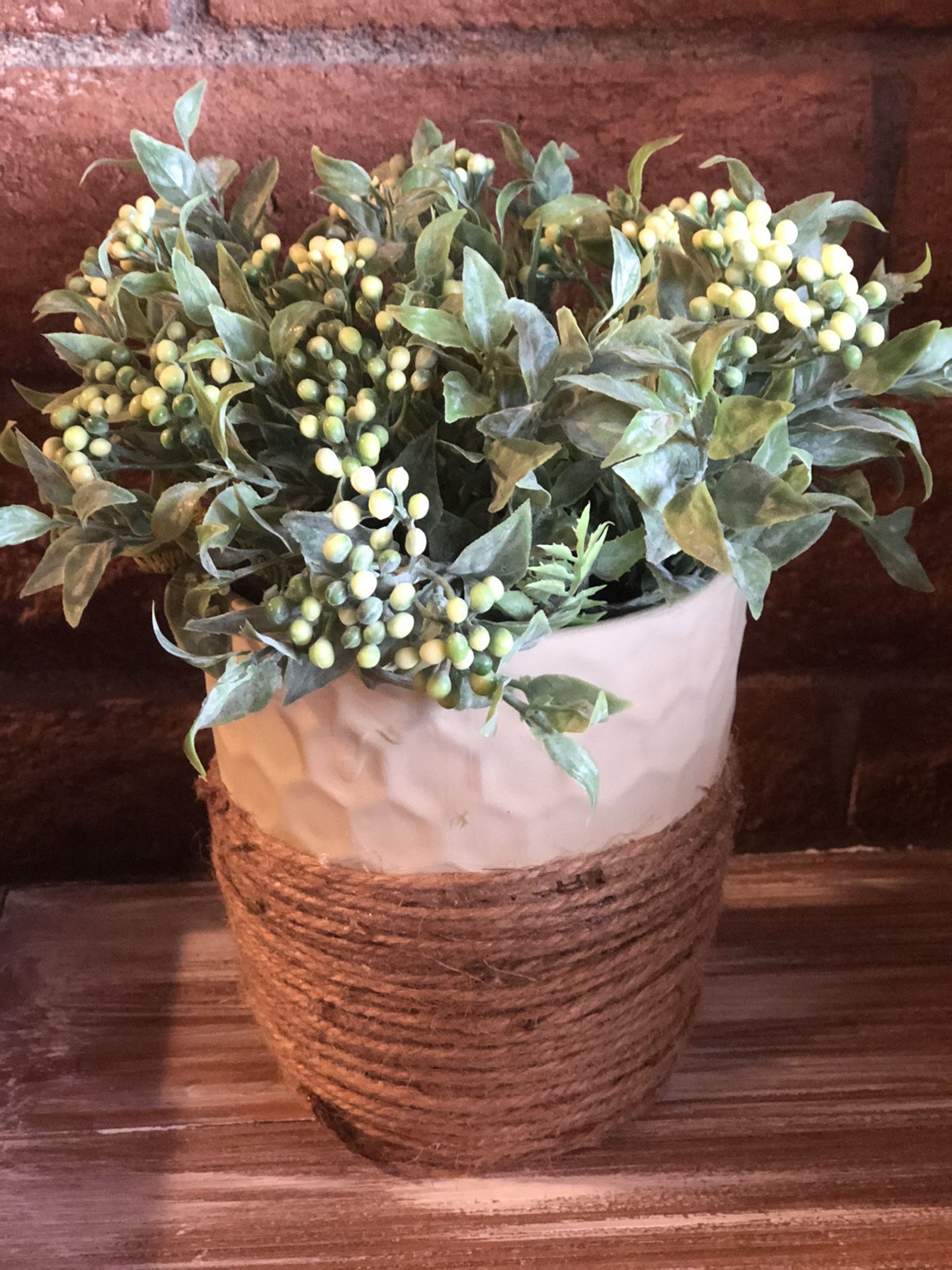 Ivory and jute planter with foliage