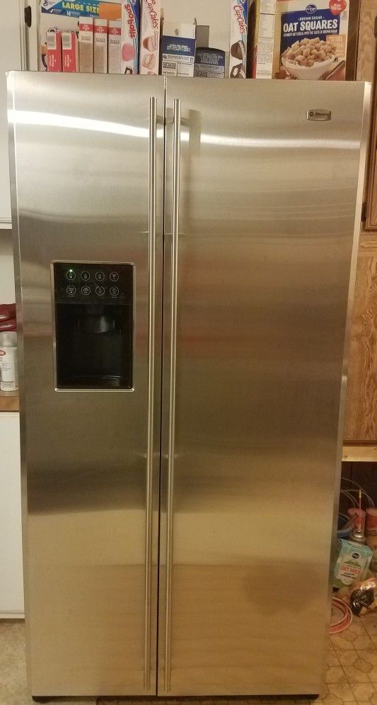 GE Monogram stainless side by side water and ice works.