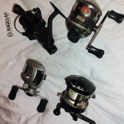 4 Fishing Reels ( nothing wrong W them)