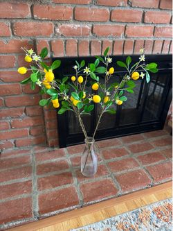 Faux lemon branches in vintage pace milk jug