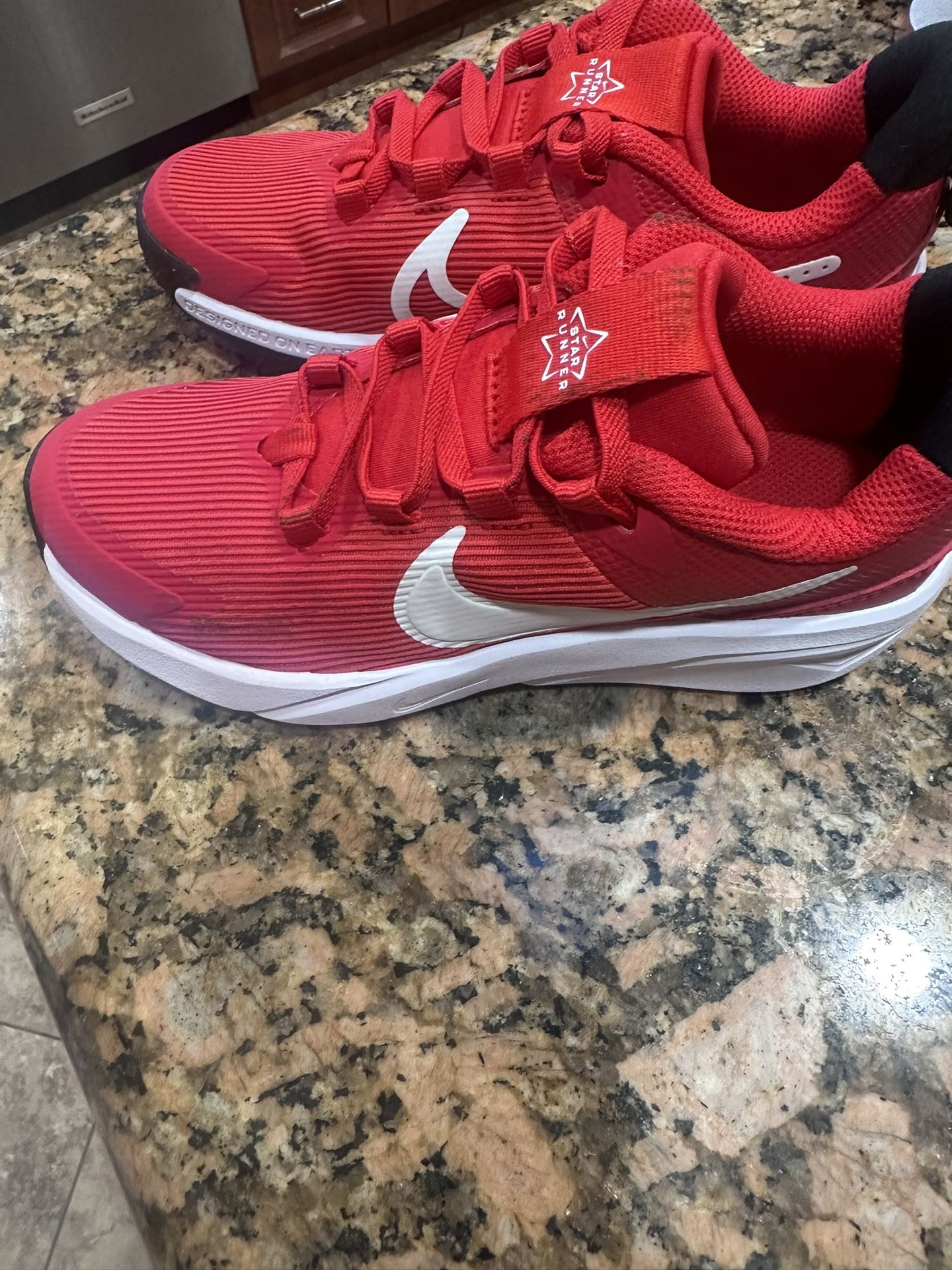Boy’s red Nike