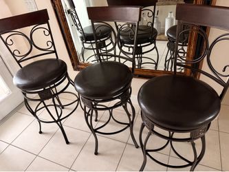 3 bar stools , like new .