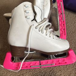 Size one figure skate white and brown with pink blade covers for little girls