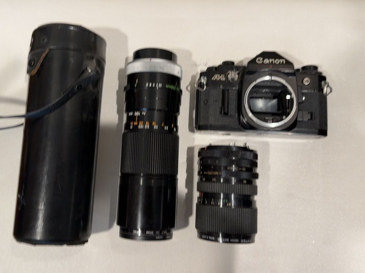 Canon A-1 + 35-70 mm zoom + 100-200 mm zoom Package
