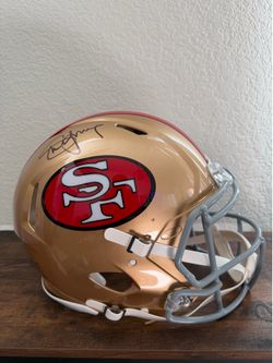 “NFL Autographed Helmet Collection – Steve Young Signed 49ers Helmet + Puka Nacua/Kyren Williams Dual Signed Rams SpeedFlex Helmet. Authenticated.