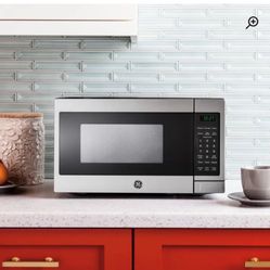 Brand New Countertop GE Microwave 
