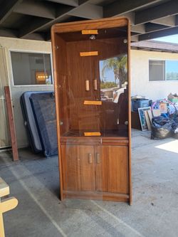 Oak cabinet with lighting