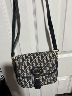Cartera Dior fake