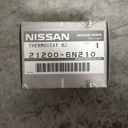 New In Box OEM Nissan Thermostat