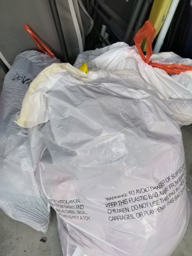 4 Bags Of Women's Clothes Sizes Small, Medium And Large