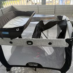 92)  Graco Pack 'n Play Day2Dream Travel Corral with Moses that Includes Portable Moses,