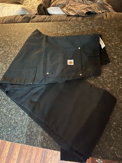 Black Carhartt work pants (size 36x34).