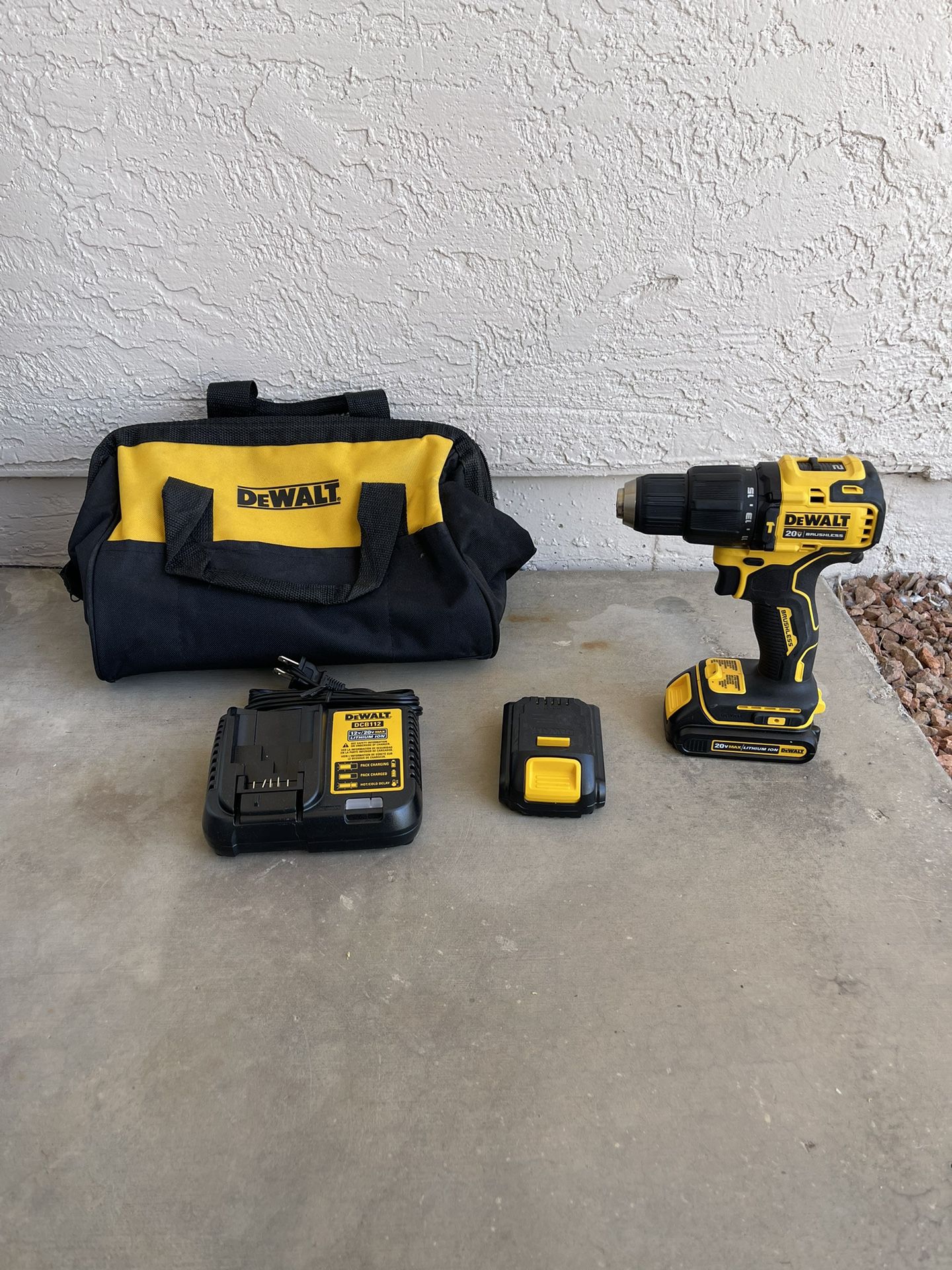 DEWALT ATOMIC 20V MAX Cordless Brushless Compact 1/2 in. Hammer Drill and (2) 20V 1.3Ah Battery And Charger 