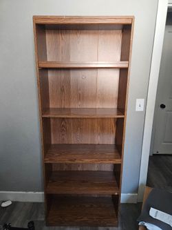 Brown bookcase shelf dresser