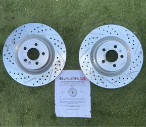 Baer Sport drilled and slotted brake rotors for Ford Mustang GT.