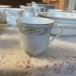 2 Sets Of Plates and Cups