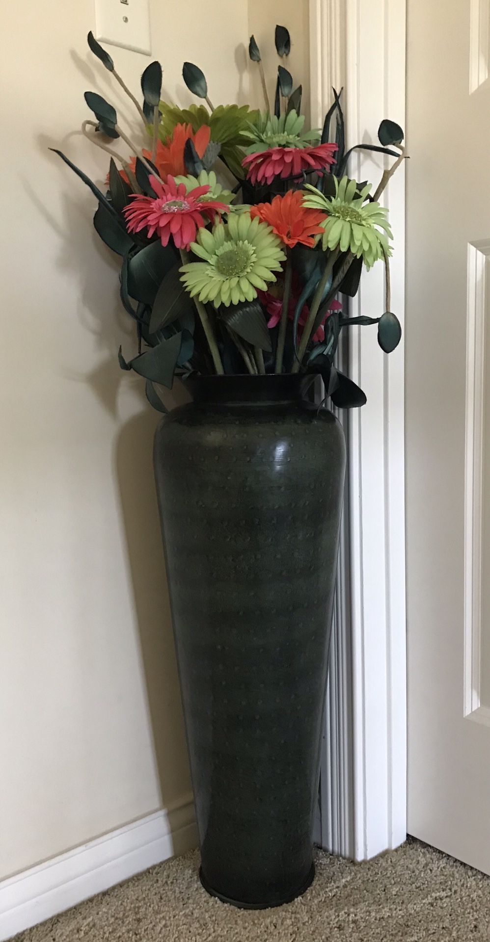 Very beautiful heavy metal tall vase $50 ( flowers r not included )