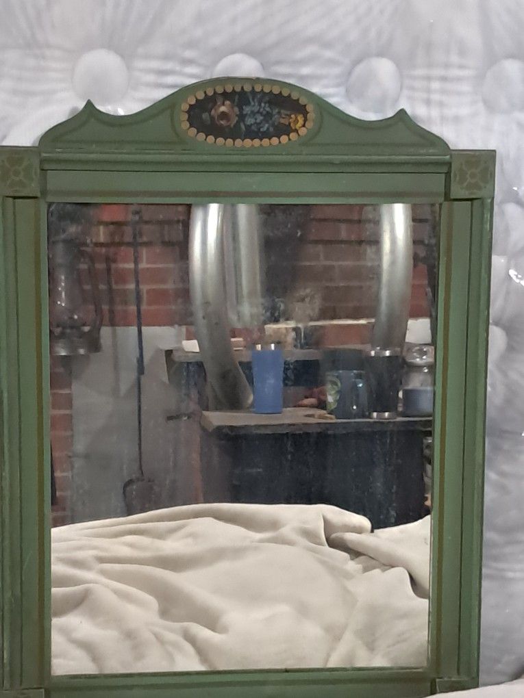 Antique Mirror With Face Painted On The Back