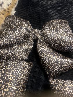Cheetah satin bow pillow and two other satin pillows