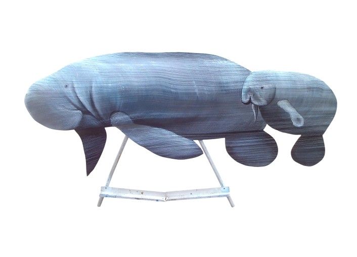 Mother Manatee and baby hand carved from palm tree frond