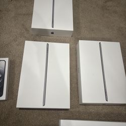 Empty iPad And iPhone Boxes