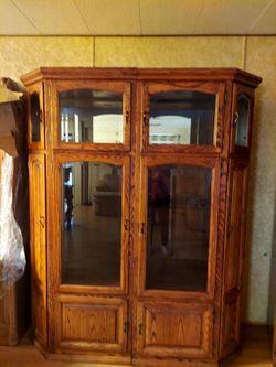 Large cabinet with shelves and lights