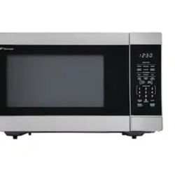 STAINLESS STEEL MICROWAVE OVER THE COUNTER....NEW....$ 120