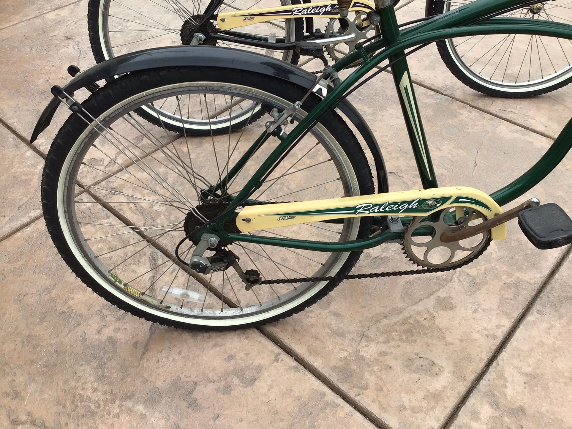 Beach Cruisers Raleigh Retroglide Bikes. Black And Green Bikes