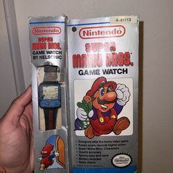 Super Maro bros vintage game watch NELSONIC