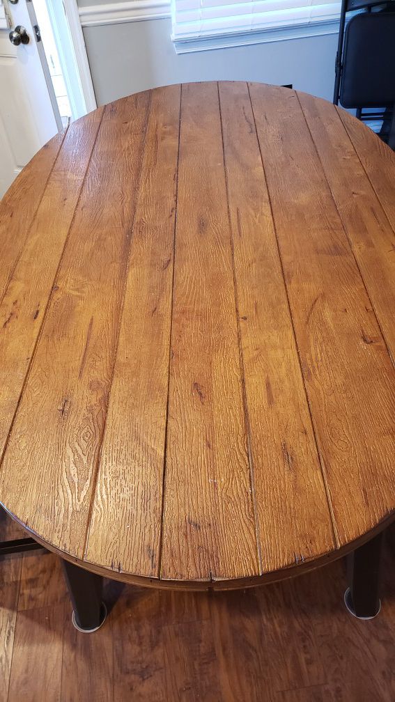 Kitchen Table with 2 Chairs and Bench.really nice set. 70 in length,, 41 in width Rustic look
