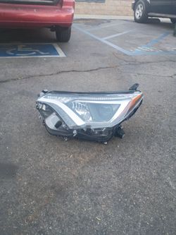 $20 passenger headlight