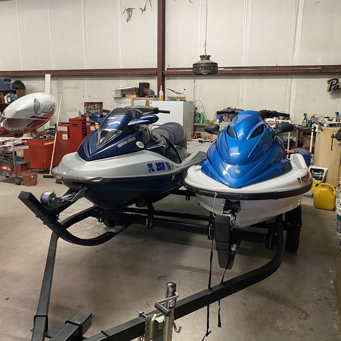 Two Jet Skis, And Dual Trailer