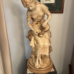 Girl Sitting Pouring Water Statue