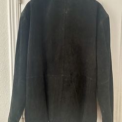 Stunning black leather jacket. Brand new.