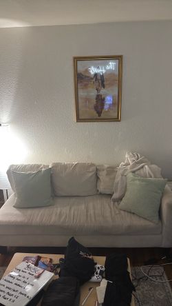 Beige/ off-white sofa