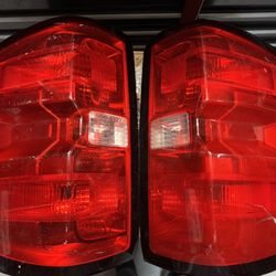 2014 Chevrolet Silverado 1500 LT Crew Cab Taillights. 160.00 OBO for both or 80.00 OBO individual Passenger side has lens cracked but no white light e