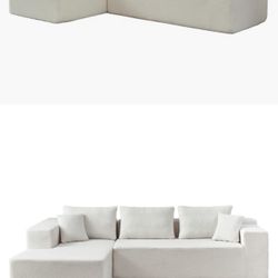 Very good condition white/cream colored L shaped modular sectioned sofa 