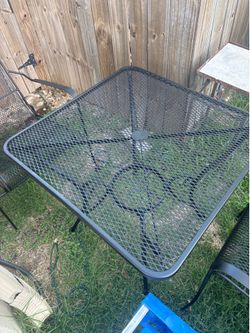 Wrought iron table & chairs